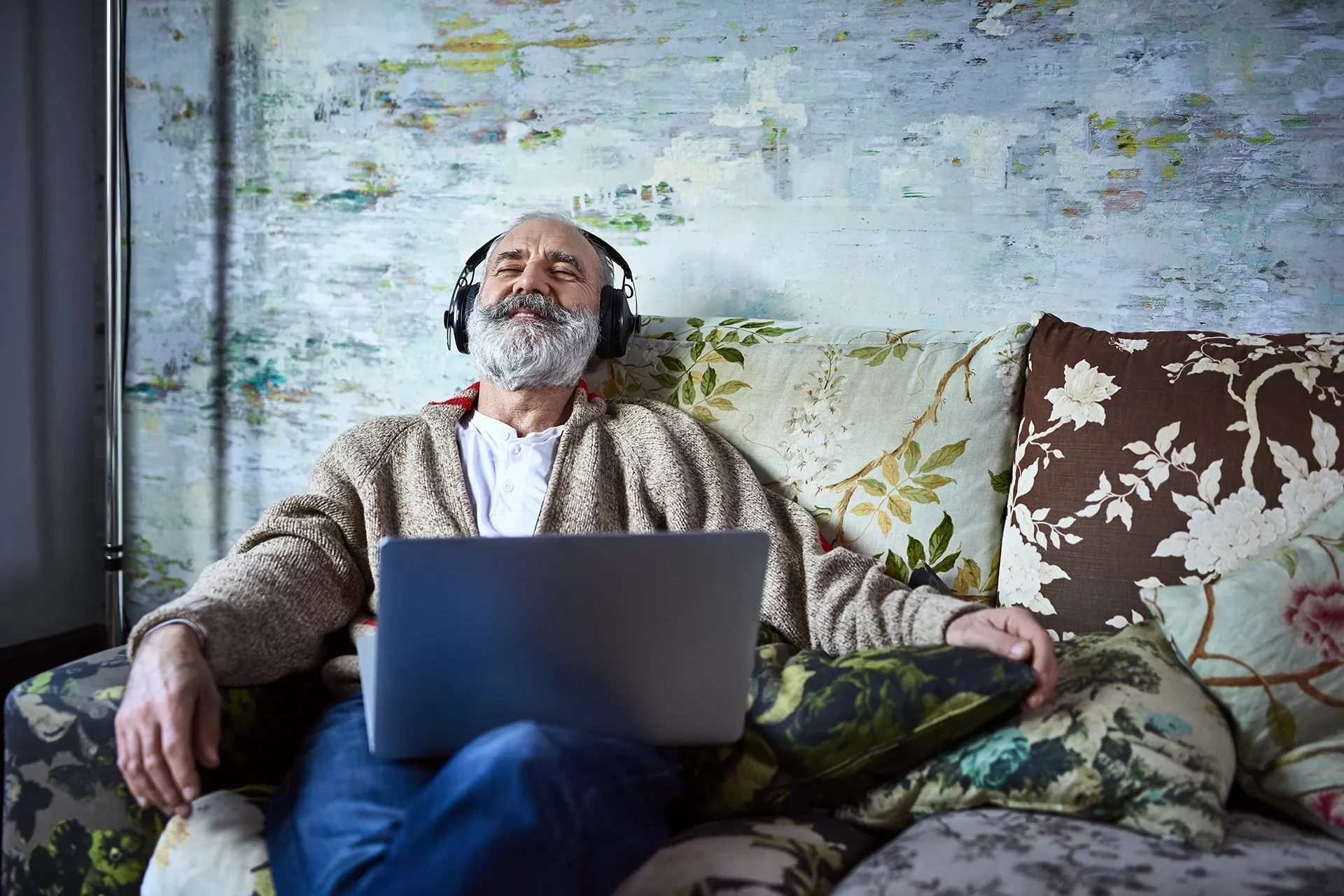 Older man listening to music