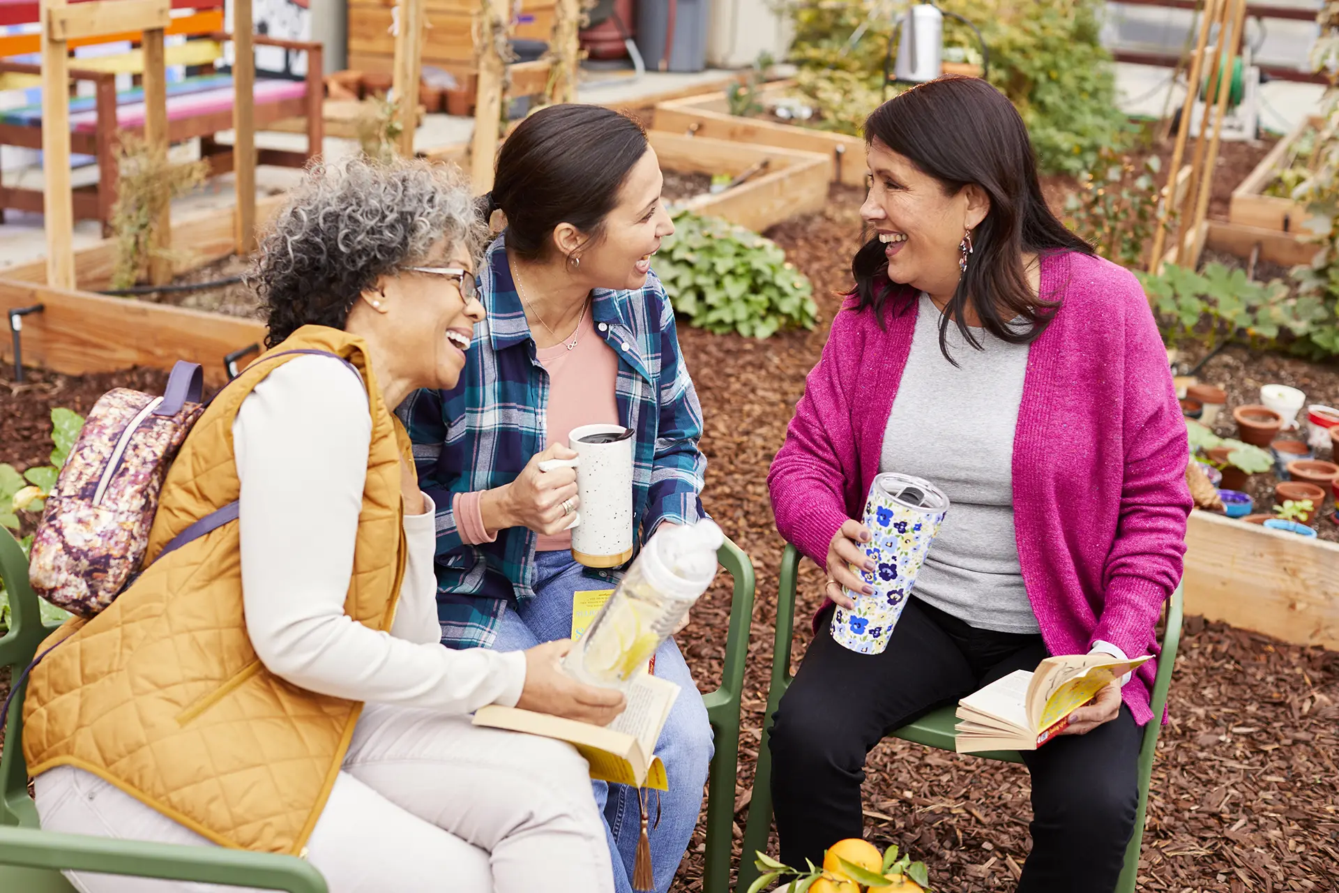 Elderly woman talking in community garden